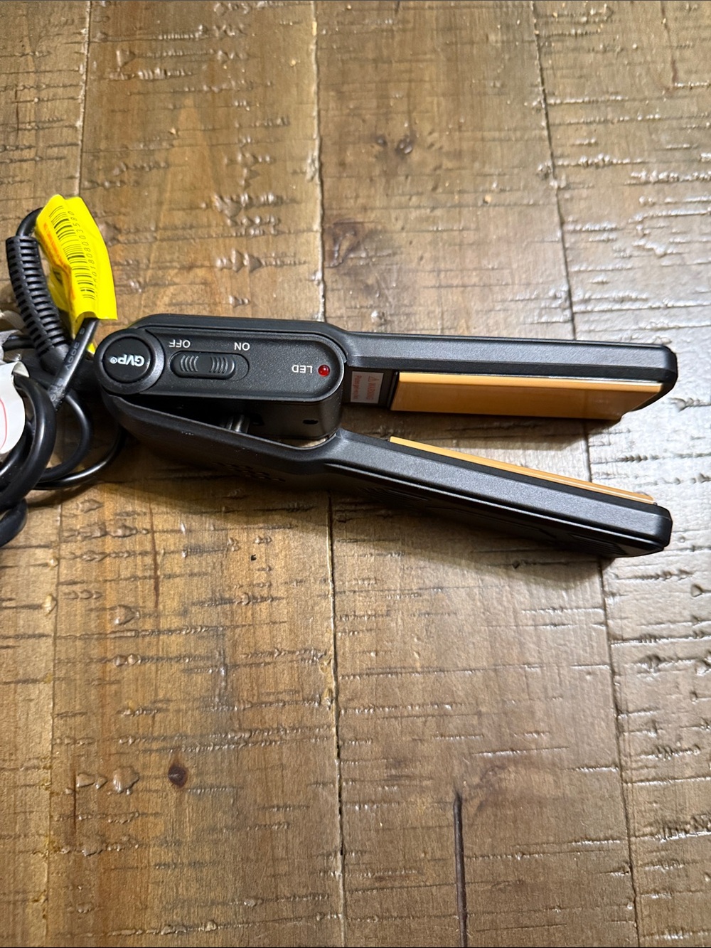 GVP Mini Hair Straightener Flat Iron in Black and Gold good for traveling.